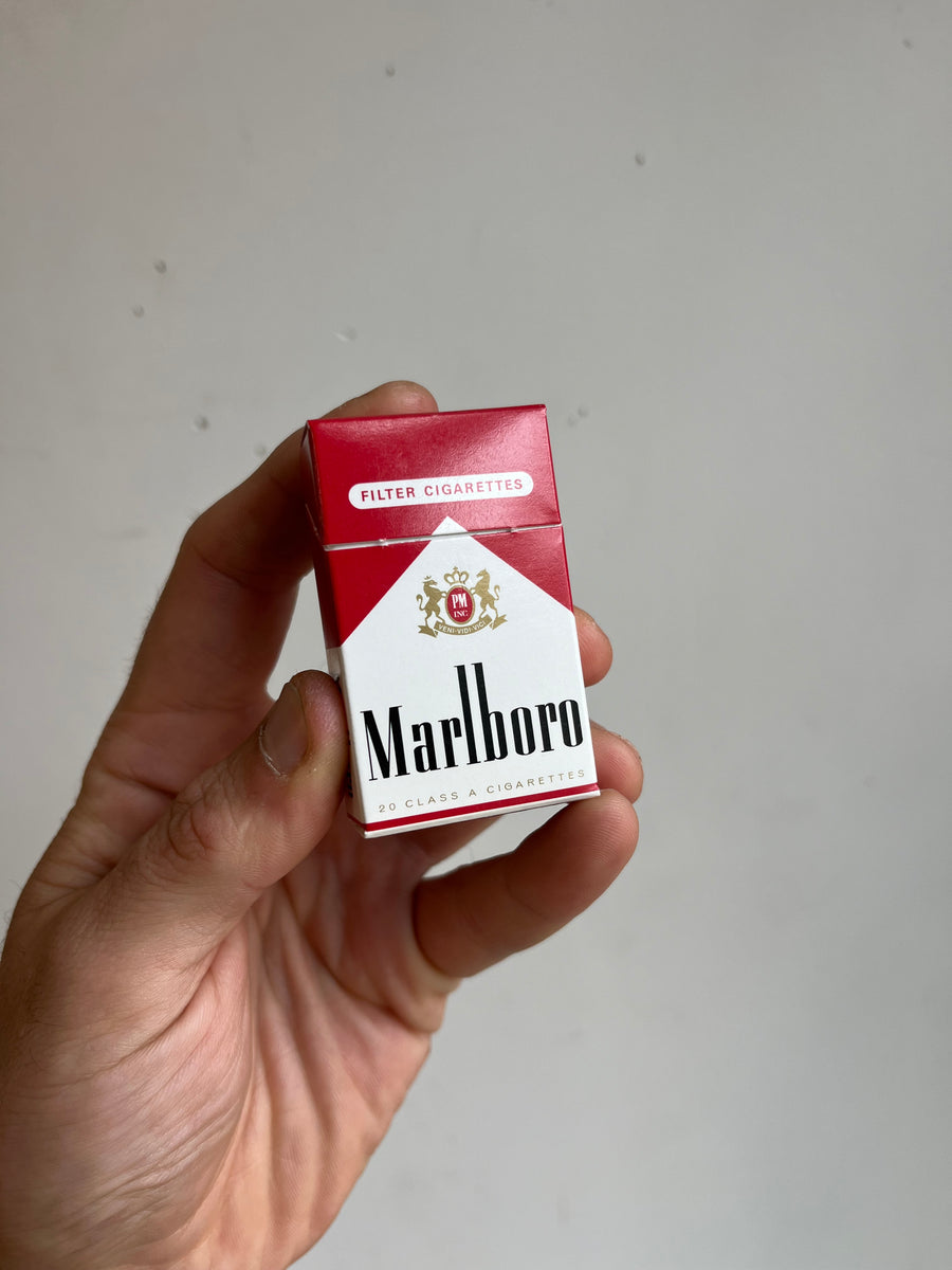 woman who smoke cigarettes Young Woman Smoking Cigarette On Blue Stock Photo 170157731